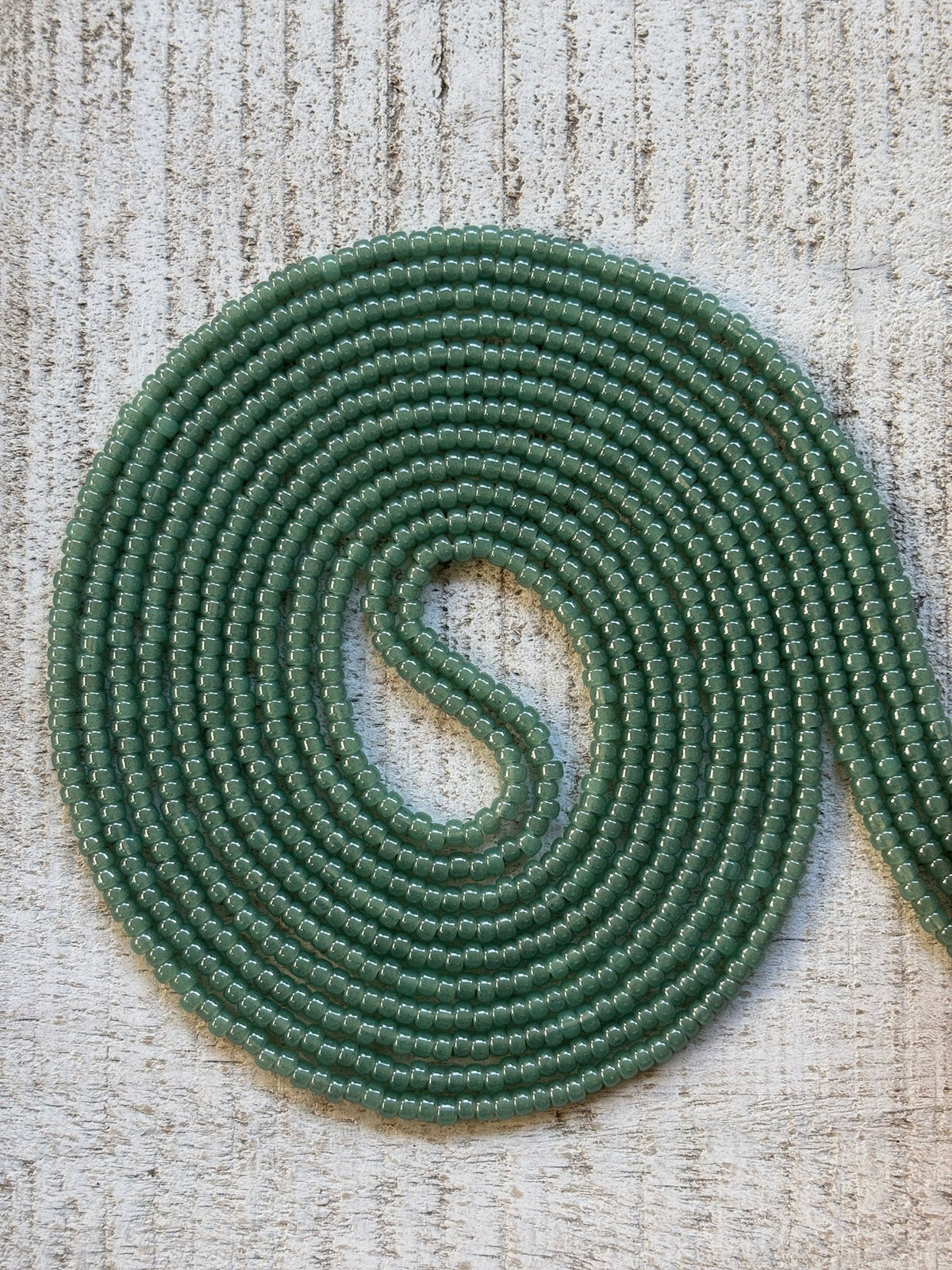 Jade sage green waist bead strand close-up