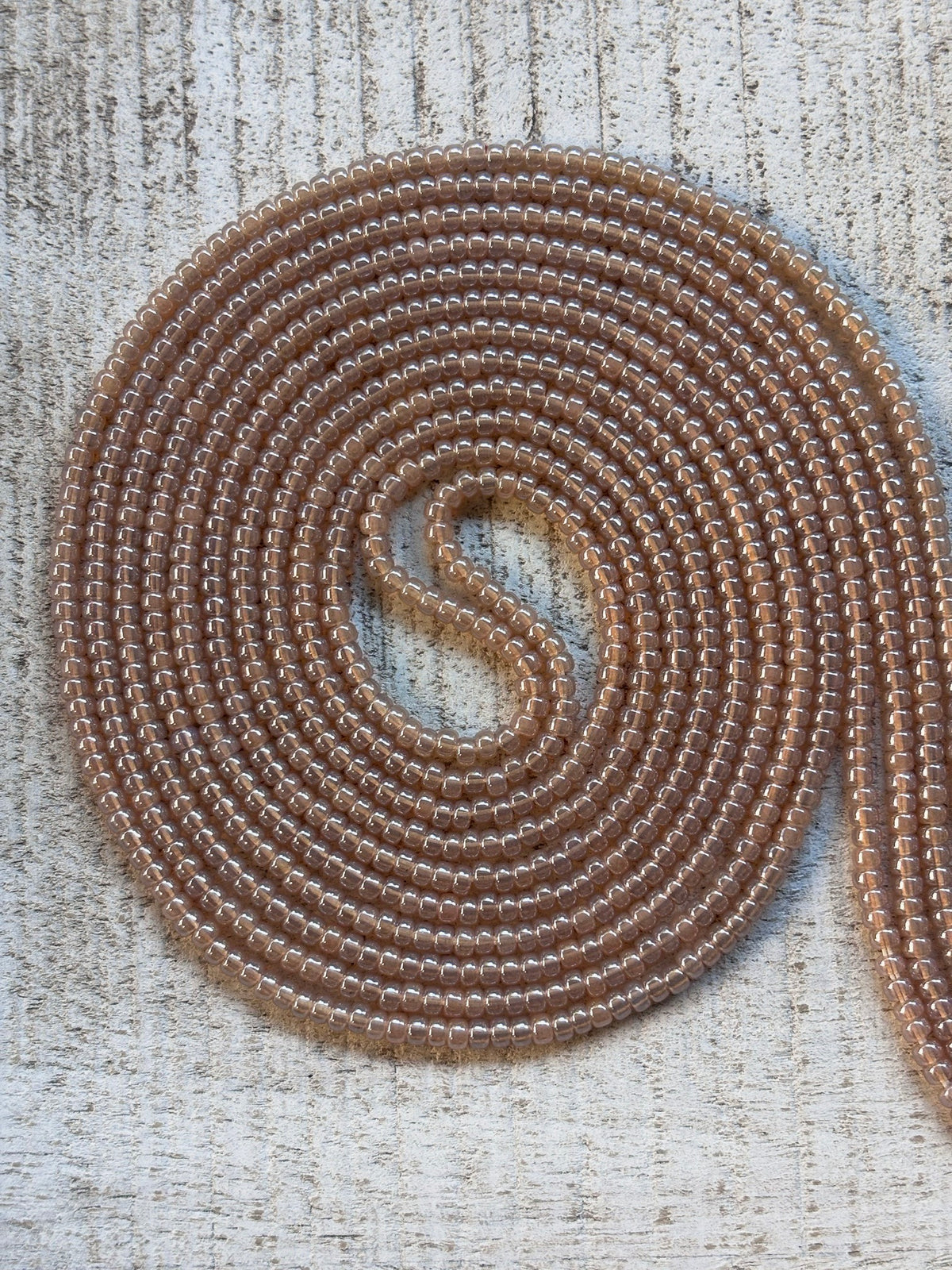Topaz champagne waist bead strand close-up