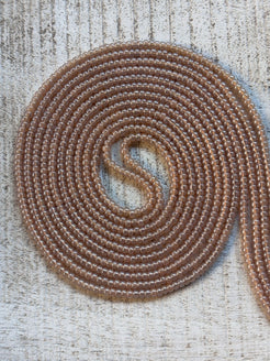 Topaz champagne waist bead strand close-up